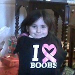 Santa knew exactly what Sofia wanted to support her Aunt Muffin's memory...an I Heart Boobs Youth's shirt. Gift from Santa